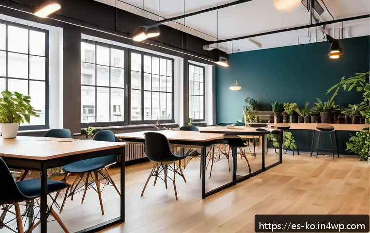 코워킹 스페이스의 비용 절감 방안 - A modern coworking space with a smart modular furniture layout, featuring foldable desks and shared ...